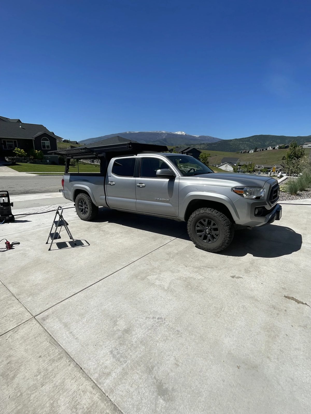 Fully detailed Toyota Tacoma with Montana mountains behind