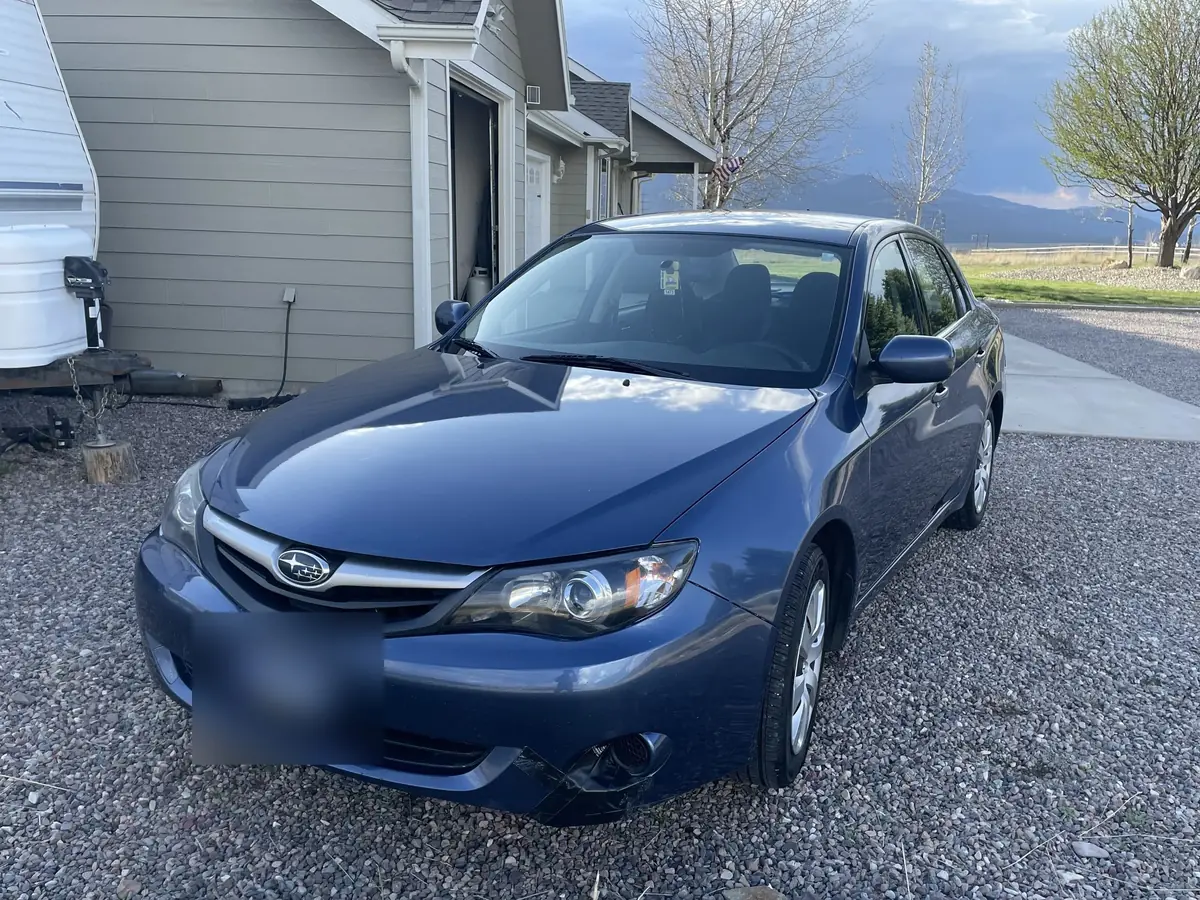 Clean blue Subaru after an exterior detail by Herd Detailing in Missoula