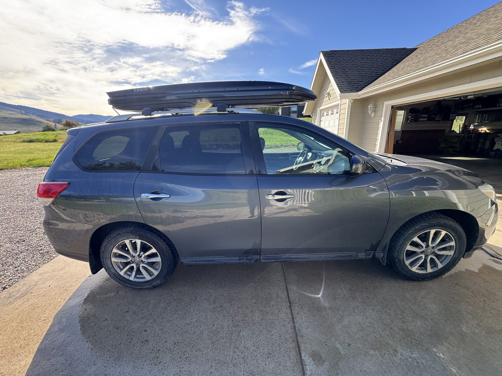 Detailed Nissan Pathfinder exterior with Missoula valley scenery