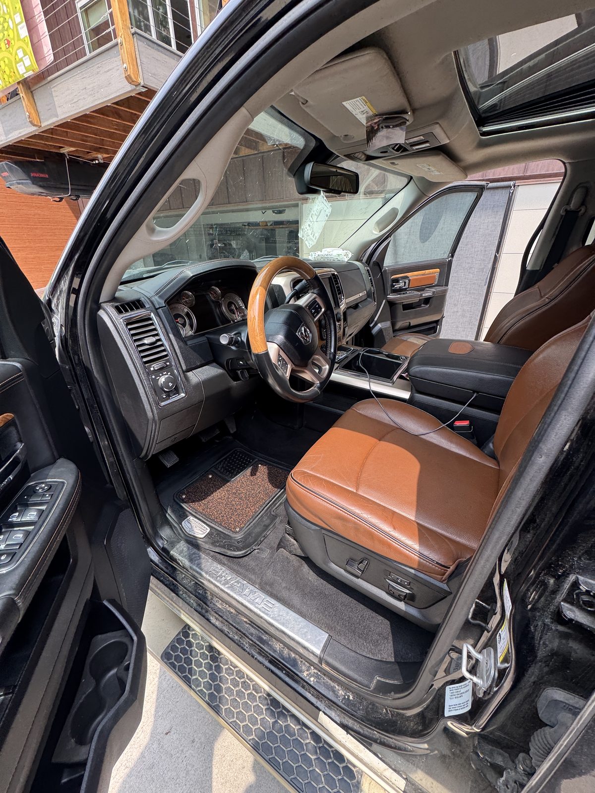 Brown leather Ram Laramie truck interior after a full detail