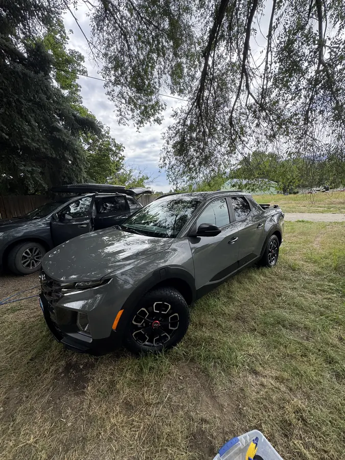 Gray Hyundai Santa Cruz after an exterior detail in Missoula